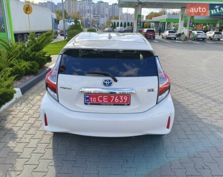 Белый Тойота Aqua, объемом двигателя 1.5 л и пробегом 73 тыс. км за 12900 $, фото 5 на Automoto.ua