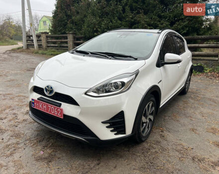 Белый Тойота Aqua, объемом двигателя 1.5 л и пробегом 61 тыс. км за 13200 $, фото 1 на Automoto.ua