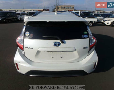 Белый Тойота Aqua, объемом двигателя 1.5 л и пробегом 79 тыс. км за 12700 $, фото 3 на Automoto.ua