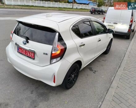 Белый Тойота Aqua, объемом двигателя 1.5 л и пробегом 73 тыс. км за 12900 $, фото 37 на Automoto.ua