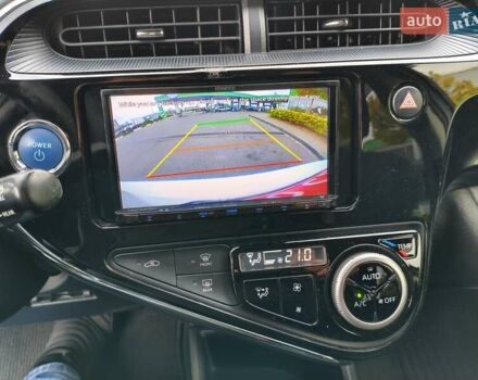 Белый Тойота Aqua, объемом двигателя 1.5 л и пробегом 73 тыс. км за 12900 $, фото 40 на Automoto.ua