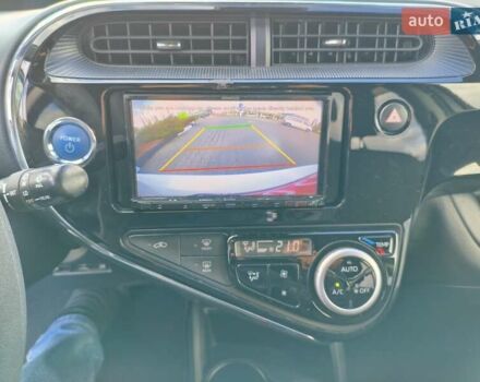 Белый Тойота Aqua, объемом двигателя 1.5 л и пробегом 73 тыс. км за 12900 $, фото 27 на Automoto.ua