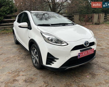 Белый Тойота Aqua, объемом двигателя 1.5 л и пробегом 61 тыс. км за 13200 $, фото 3 на Automoto.ua