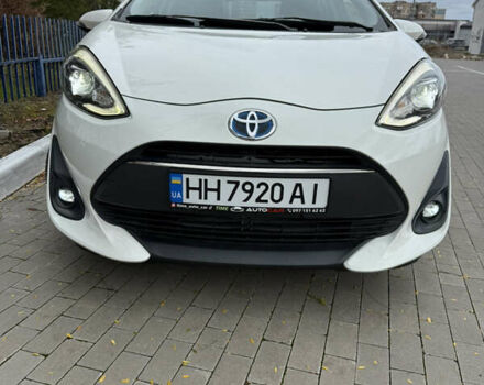 Білий Тойота Aqua, об'ємом двигуна 1.5 л та пробігом 86 тис. км за 12800 $, фото 1 на Automoto.ua