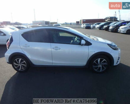 Белый Тойота Aqua, объемом двигателя 1.5 л и пробегом 79 тыс. км за 12700 $, фото 5 на Automoto.ua