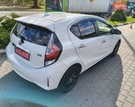 Белый Тойота Aqua, объемом двигателя 1.5 л и пробегом 73 тыс. км за 12900 $, фото 3 на Automoto.ua