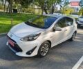 Белый Тойота Aqua, объемом двигателя 1.5 л и пробегом 73 тыс. км за 13200 $, фото 1 на Automoto.ua