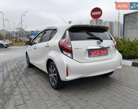Белый Тойота Aqua, объемом двигателя 1.5 л и пробегом 73 тыс. км за 12800 $, фото 12 на Automoto.ua