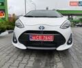 Белый Тойота Aqua, объемом двигателя 1.5 л и пробегом 73 тыс. км за 12800 $, фото 3 на Automoto.ua