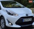 Білий Тойота Aqua, об'ємом двигуна 1.5 л та пробігом 80 тис. км за 12699 $, фото 4 на Automoto.ua
