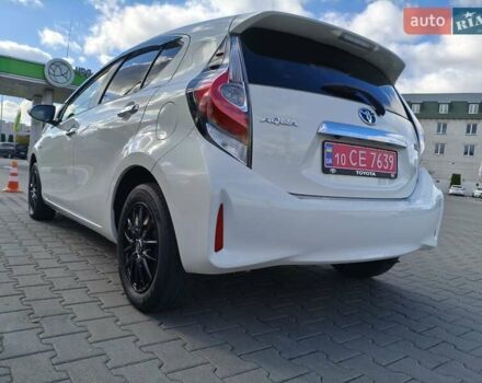 Белый Тойота Aqua, объемом двигателя 1.5 л и пробегом 73 тыс. км за 12900 $, фото 8 на Automoto.ua