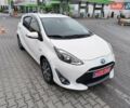Белый Тойота Aqua, объемом двигателя 1.5 л и пробегом 73 тыс. км за 12800 $, фото 4 на Automoto.ua