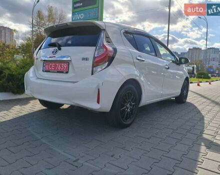 Белый Тойота Aqua, объемом двигателя 1.5 л и пробегом 73 тыс. км за 12900 $, фото 4 на Automoto.ua