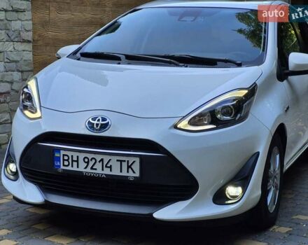 Білий Тойота Aqua, об'ємом двигуна 1.5 л та пробігом 80 тис. км за 12699 $, фото 2 на Automoto.ua