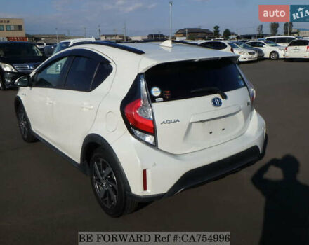 Белый Тойота Aqua, объемом двигателя 1.5 л и пробегом 79 тыс. км за 12700 $, фото 2 на Automoto.ua