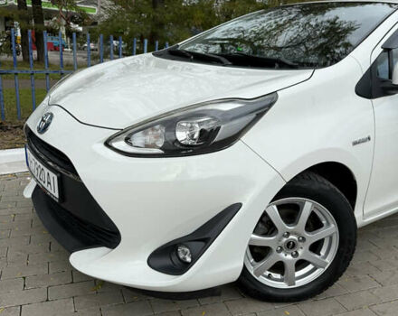 Білий Тойота Aqua, об'ємом двигуна 1.5 л та пробігом 86 тис. км за 12800 $, фото 17 на Automoto.ua