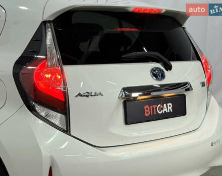 Білий Тойота Aqua, об'ємом двигуна 1.5 л та пробігом 87 тис. км за 13200 $, фото 21 на Automoto.ua