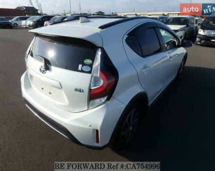 Белый Тойота Aqua, объемом двигателя 1.5 л и пробегом 79 тыс. км за 12700 $, фото 4 на Automoto.ua