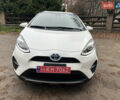 Белый Тойота Aqua, объемом двигателя 1.5 л и пробегом 61 тыс. км за 13200 $, фото 2 на Automoto.ua