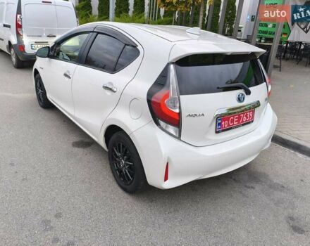 Белый Тойота Aqua, объемом двигателя 1.5 л и пробегом 73 тыс. км за 12900 $, фото 38 на Automoto.ua