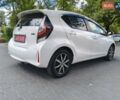 Белый Тойота Aqua, объемом двигателя 1.5 л и пробегом 74 тыс. км за 13400 $, фото 4 на Automoto.ua