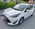 Белый Тойота Aqua, объемом двигателя 1.5 л и пробегом 57 тыс. км за 13200 $, фото 1 на Automoto.ua