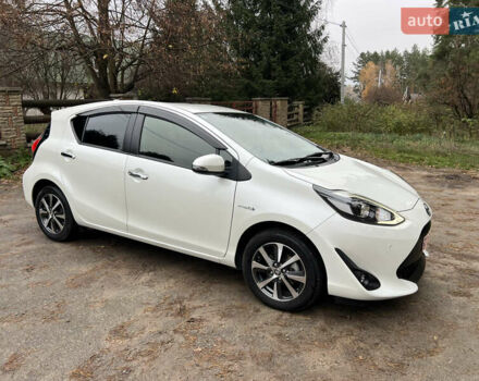 Білий Тойота Aqua, об'ємом двигуна 1.5 л та пробігом 61 тис. км за 13200 $, фото 6 на Automoto.ua