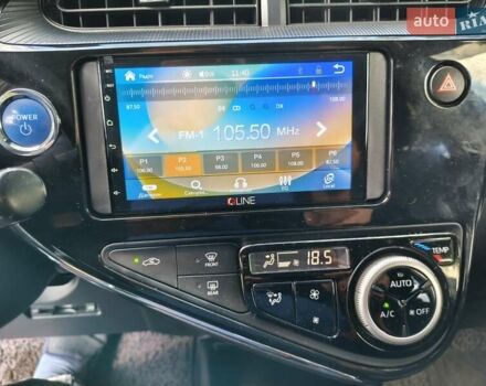Белый Тойота Aqua, объемом двигателя 1.5 л и пробегом 74 тыс. км за 13400 $, фото 24 на Automoto.ua