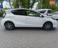 Белый Тойота Aqua, объемом двигателя 1.5 л и пробегом 74 тыс. км за 13400 $, фото 2 на Automoto.ua