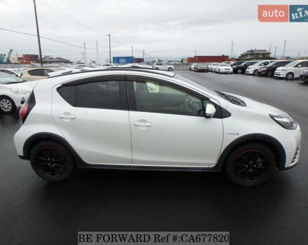 Белый Тойота Aqua, объемом двигателя 1.5 л и пробегом 27 тыс. км за 13500 $, фото 6 на Automoto.ua