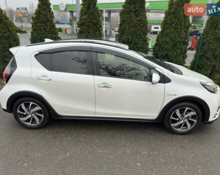 Белый Тойота Aqua, объемом двигателя 1.5 л и пробегом 79 тыс. км за 15950 $, фото 24 на Automoto.ua