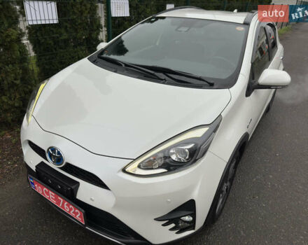 Белый Тойота Aqua, объемом двигателя 1.5 л и пробегом 79 тыс. км за 15950 $, фото 2 на Automoto.ua