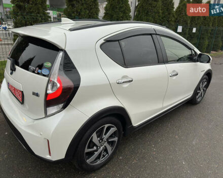 Белый Тойота Aqua, объемом двигателя 1.5 л и пробегом 79 тыс. км за 15950 $, фото 22 на Automoto.ua