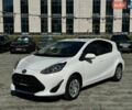 Белый Тойота Aqua, объемом двигателя 1.5 л и пробегом 56 тыс. км за 13900 $, фото 1 на Automoto.ua