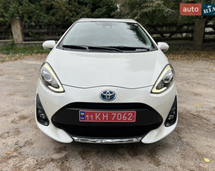 Білий Тойота Aqua, об'ємом двигуна 1.5 л та пробігом 58 тис. км за 13300 $, фото 3 на Automoto.ua