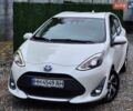 Білий Тойота Aqua, об'ємом двигуна 1.5 л та пробігом 61 тис. км за 13500 $, фото 1 на Automoto.ua