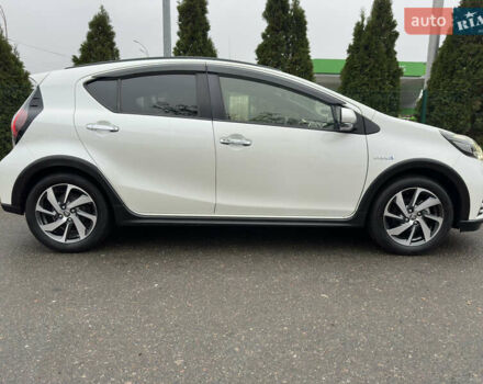 Белый Тойота Aqua, объемом двигателя 1.5 л и пробегом 79 тыс. км за 15950 $, фото 23 на Automoto.ua