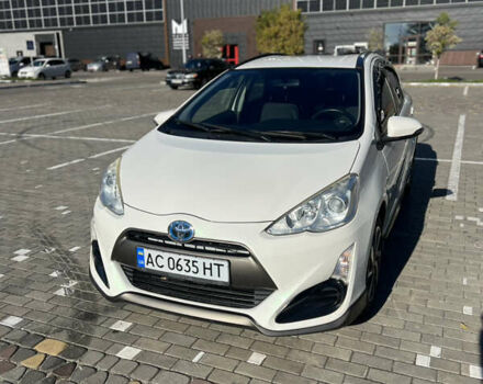 Белый Тойота Aqua, объемом двигателя 1.5 л и пробегом 88 тыс. км за 10700 $, фото 1 на Automoto.ua