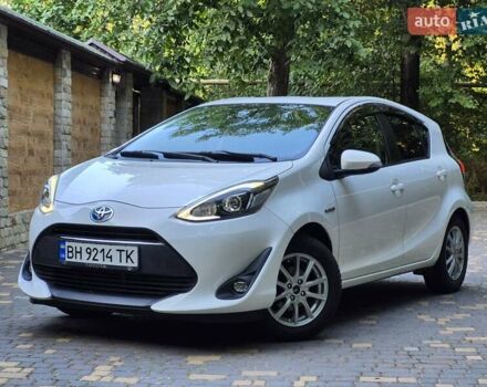 Білий Тойота Aqua, об'ємом двигуна 1.5 л та пробігом 80 тис. км за 12699 $, фото 1 на Automoto.ua