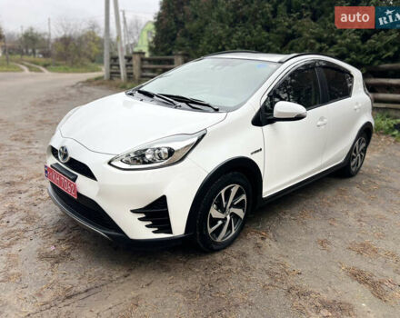 Белый Тойота Aqua, объемом двигателя 1.5 л и пробегом 61 тыс. км за 13200 $, фото 1 на Automoto.ua