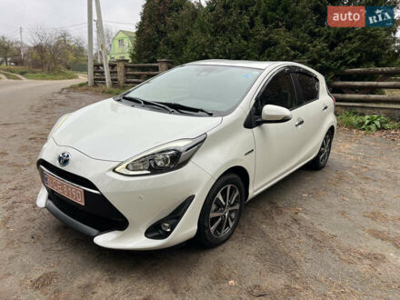 Білий Тойота Aqua, об'ємом двигуна 1.5 л та пробігом 61 тис. км за 13200 $, фото 1 на Automoto.ua