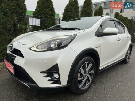 Белый Тойота Aqua, объемом двигателя 1.5 л и пробегом 79 тыс. км за 15950 $, фото 1 на Automoto.ua