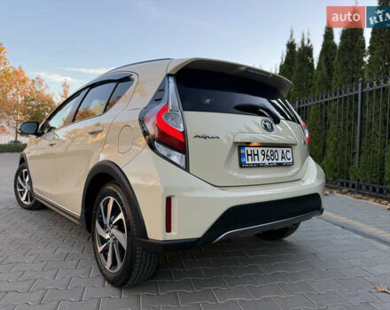 Бежевий Тойота Aqua, об'ємом двигуна 1.5 л та пробігом 79 тис. км за 13900 $, фото 54 на Automoto.ua