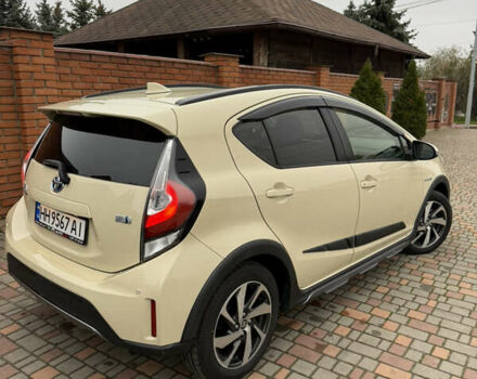 Бежевый Тойота Aqua, объемом двигателя 1.5 л и пробегом 90 тыс. км за 13700 $, фото 27 на Automoto.ua