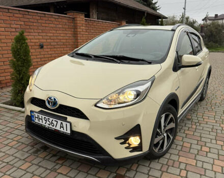 Бежевый Тойота Aqua, объемом двигателя 1.5 л и пробегом 90 тыс. км за 13700 $, фото 13 на Automoto.ua