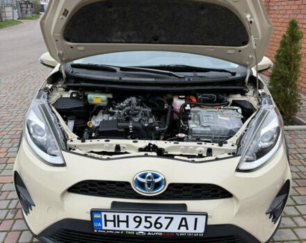 Бежевый Тойота Aqua, объемом двигателя 1.5 л и пробегом 90 тыс. км за 13700 $, фото 62 на Automoto.ua