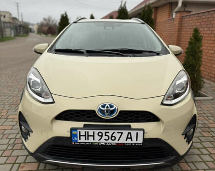Бежевый Тойота Aqua, объемом двигателя 1.5 л и пробегом 90 тыс. км за 13700 $, фото 1 на Automoto.ua