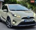 Бежевий Тойота Aqua, об'ємом двигуна 1.5 л та пробігом 71 тис. км за 14499 $, фото 1 на Automoto.ua