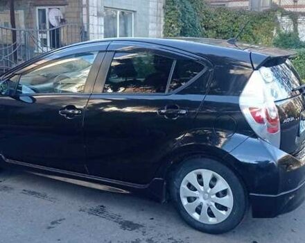 Черный Тойота Aqua, объемом двигателя 1.5 л и пробегом 181 тыс. км за 9400 $, фото 4 на Automoto.ua