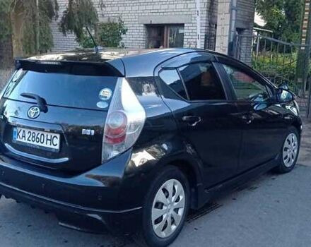 Черный Тойота Aqua, объемом двигателя 1.5 л и пробегом 181 тыс. км за 9400 $, фото 5 на Automoto.ua